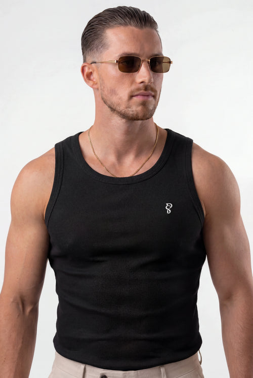 [Black] Man wearing a black tank top with a small logo on a white background