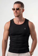 [Black] Man wearing a black tank top with a small logo on a white background